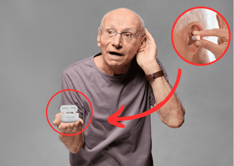 Senior man holding his pair of Atom Pro 2s